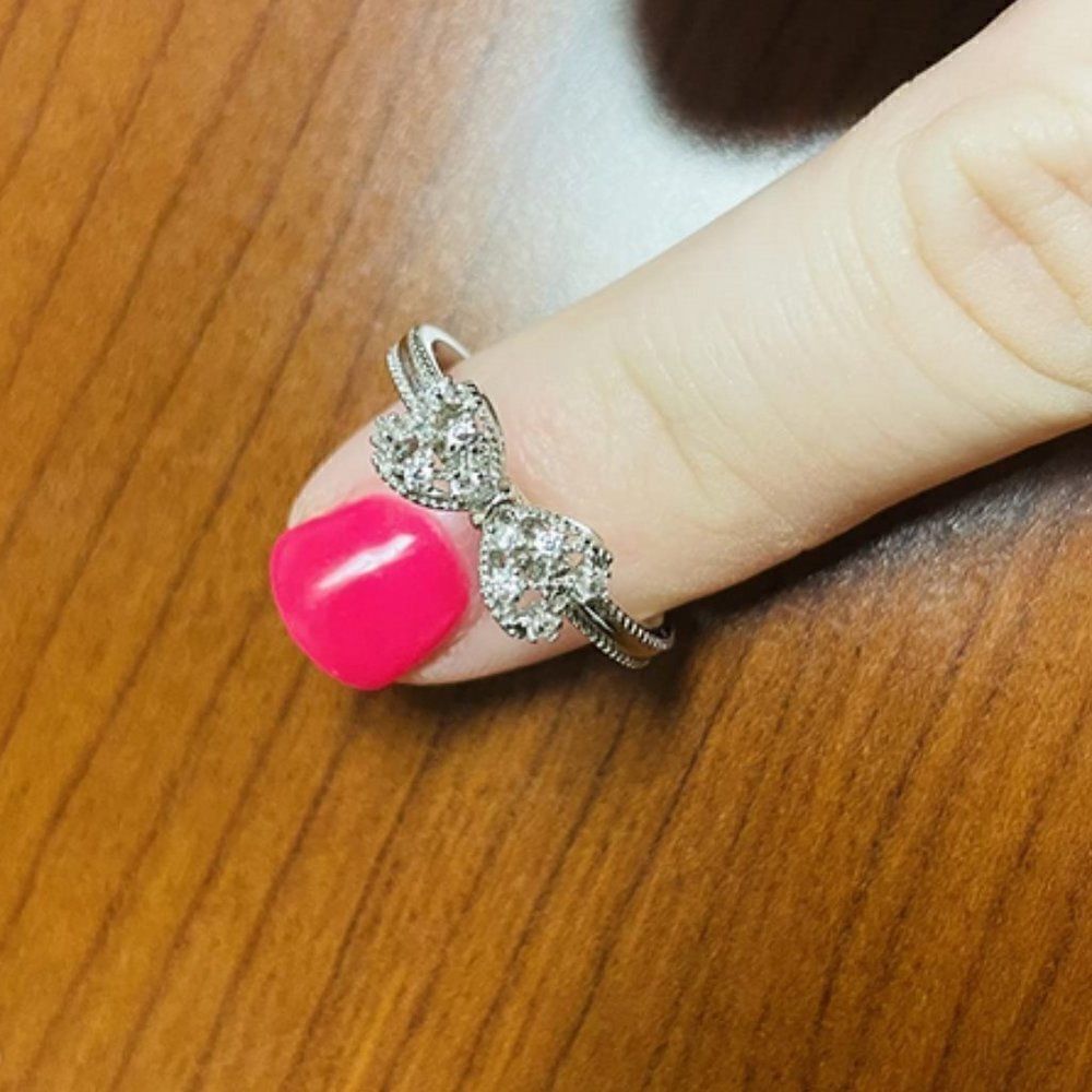 .925 Sterling Silver with White Diamond Cubic Zirconia Infinity Forever Bow Ring - Picture 8 of 10